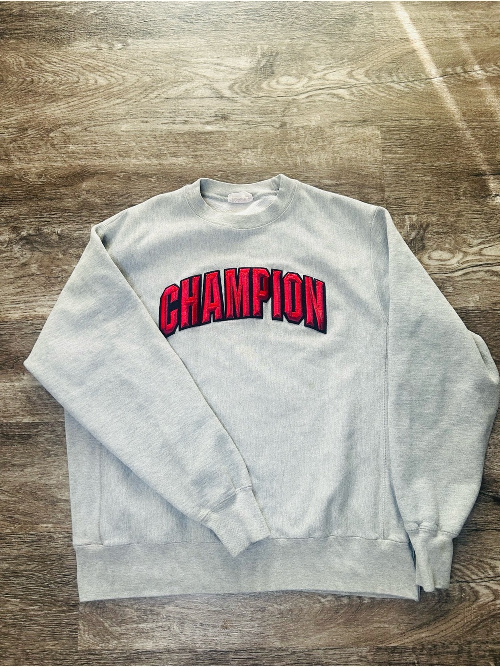 Champion Light Gray Crewneck Sweatshirt with Red Arch Logo
